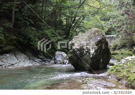 Mountain megalith river 82392884