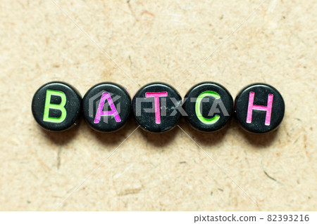 Black color round alphabet letter block in word batch on wood background Black color round alphabet letter block in word batch on wood background 82393216