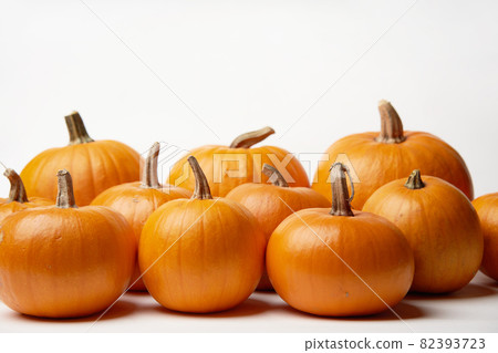 Orange halloween pumpkins standing in line on white background 82393723