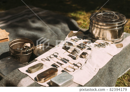 Old Medical And Surgical Instruments. Many Surgical Instruments For Surgery. Old Different Metal Medical Instruments Objects. Retro Stainless Surgical Equipment Tools Old Medical And Surgical Instruments. Many Surgical Instruments For Surgery. Old Different Metal Medical Instruments Objects. Retro Stainless Surgical Equipment Tools 82394179