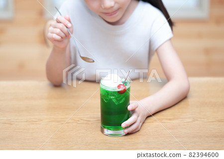Girl drinking cream soda Girl drinking cream soda 82394600