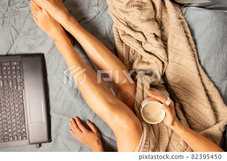 Young woman in her bed 82395450