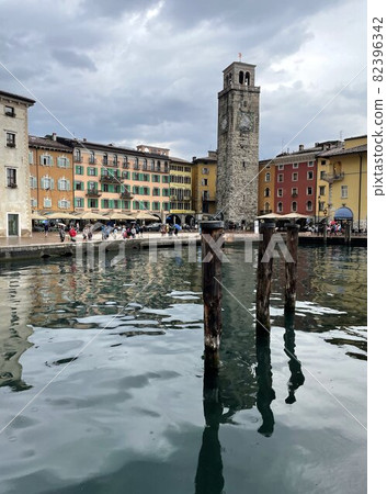 old buildings in the harbour of riva del garda lake 82396342