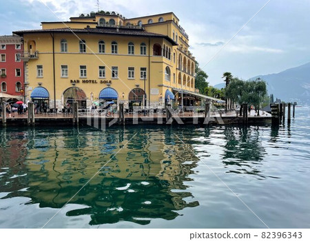 old buildings in the harbour of riva del garda lake 82396343