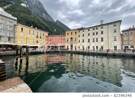 old buildings in the harbour of riva del garda lake old buildings in the harbour of riva del garda lake 82396346