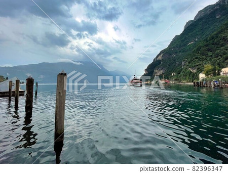 old buildings in the harbour of riva del garda lake old buildings in the harbour of riva del garda lake 82396347