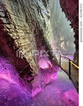 colorfull waterfall in a cave cascate del varone at riva del garda colorfull waterfall in a cave cascate del varone at riva del garda 82396352