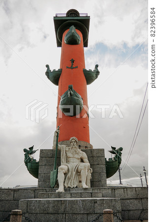 The architecture of Saint-Petersburg, Rostral column on background of blue sky The architecture of Saint-Petersburg, Rostral column on background of blue sky 82396584