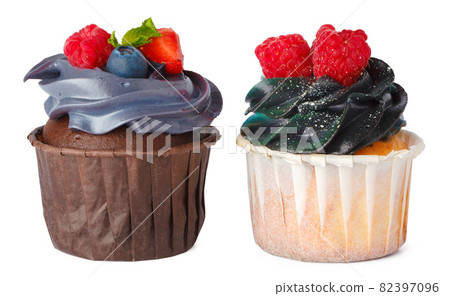 Two cupcakes isolated on white background close up Two cupcakes isolated on white background close up 82397096