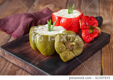 Baked stuffed peppers with ricotta Baked stuffed peppers with ricotta 82397835