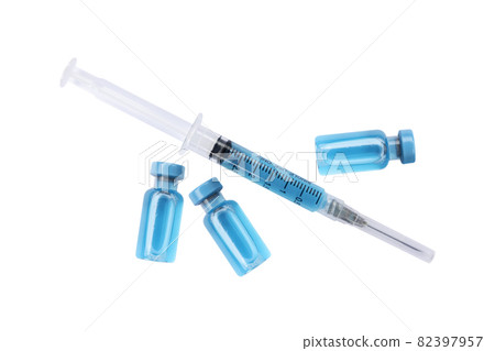 Close-up vials with vaccine and syringe for virus protection isolated on white background. Horizontal composition. Close-up vials with vaccine and syringe for virus protection isolated on white background. Horizontal composition. 82397957