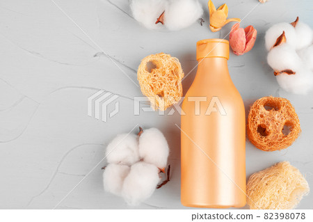 Plastic bottles of body care and beauty products composition close up Plastic bottles of body care and beauty products composition close up 82398078