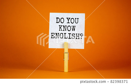 Do you know english symbol. White paper with words 'did you know', clip on wood clothespin. Beautiful orange background. Business, education and do you know english concept, copy space. Do you know english symbol. White paper with words 'did you know', clip on wood clothespin. Beautiful orange background. Business, education and do you know english concept, copy space. 82398371