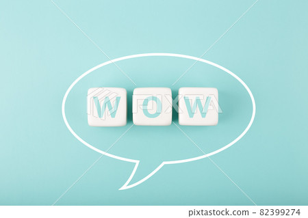 Wow speech bubble on bright blue background 82399274