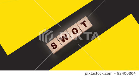 Abbreviation SWOT on wooden cubes. Business analysis concept 82400804