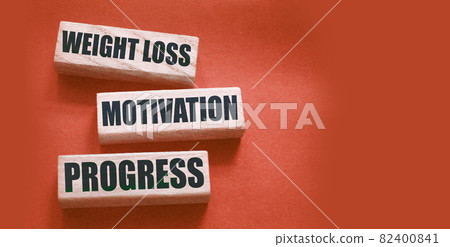 Weight loss motivation progress words on wooden blocks with copyspace. Successful diet healthy food weightloss concept 82400841
