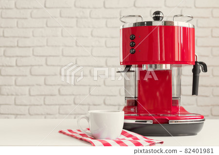 Modern kitchen. Red retro style coffee machine close up 82401981