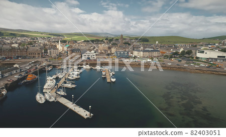 Traffic road at sea bay coast aerial. Pier town with old buildings. Ships and yachts at wharf 82403051