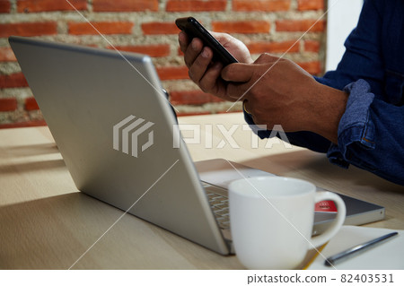 man using mobile smartphone and credit card making online payment man using mobile smartphone and credit card making online payment 82403531