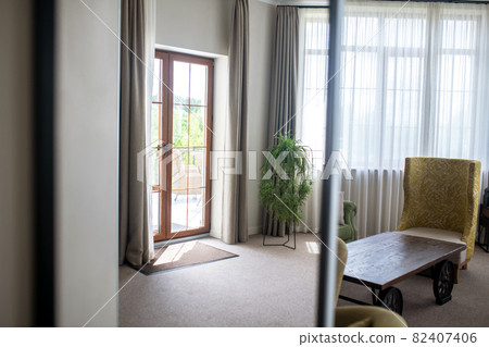 Empty living room with exquisite furniture items 82407406