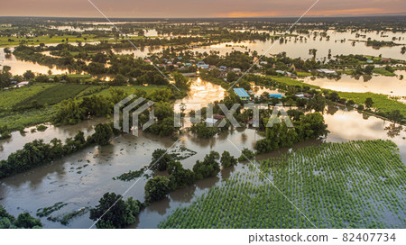 aerial view images from drone of Community and agricultural regions are being flooded. 82407734