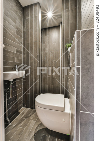 Interior of small clean toilet in miniature style Interior of small clean toilet in miniature style 82408493