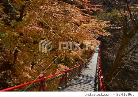 Kasaya bridge on the promenade to the autumnal trees and small, medium and large waterfalls Kasaya bridge on the promenade to the autumnal trees and small, medium and large waterfalls 82412963