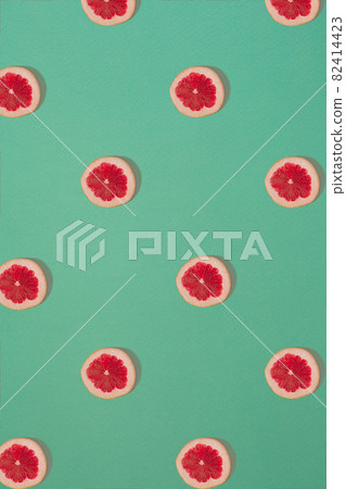 Grapefruit pattern isolated on blue background. Flat lay 82414423