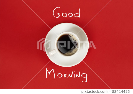 Close-up top view of cup of fresh hot coffee and good morning inscription 82414435
