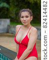 Portrait of Asian women wear swimsuits Background swimming pool 82414482