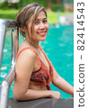 Portrait of Asian women wear swimsuits Background swimming pool 82414543