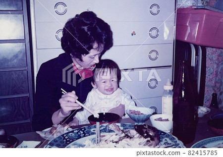 Parents and children celebrating their 1st birthday in the 1950s 82415785