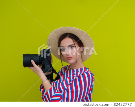 Portrait of beautiful female photographer close up 82422777
