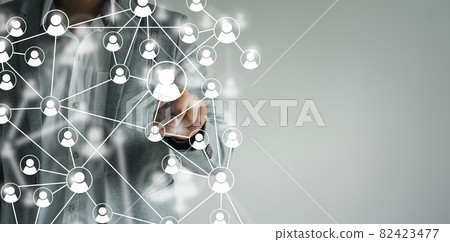 Human resources and recruiting business or team leader concept. Hand businessman touching of people icon community. Teamwork symbol of network and communication. Cooperation and working collaboration. 82423477