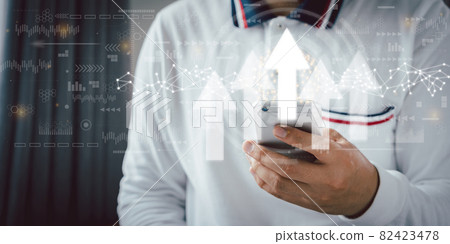 Businessman using mobile phone for business development of success and growth up concept. Point rising arrow graph corporate future level up plan. Successful investment decision. Management goal. Businessman using mobile phone for business development of success and growth up concept. Point rising arrow graph corporate future level up plan. Successful investment decision. Management goal. 82423478