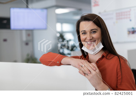 business woman portrait in medical protective mask 82425001