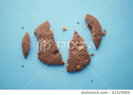 close up of broken sweet cookies on table close up of broken sweet cookies on table 82429989