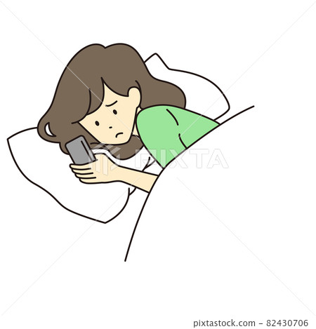 A woman watching a smartphone 82430706