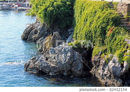 Lovran's coast,rocks and waves, Adriatic coast, Kvarner bay, city details, Croatia Lovran's coast,rocks and waves, Adriatic coast, Kvarner bay, city details, Croatia 82432154