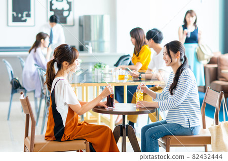 People relaxing in a cafe People relaxing in a cafe 82432444