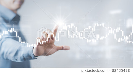 Businessman holding bar graph of analytics and financial, Changes in new planning, Business growth, ideas and perspectives, Stock investment, and dividends yield from business and stock market. Businessman holding bar graph of analytics and financial, Changes in new planning, Business growth, ideas and perspectives, Stock investment, and dividends yield from business and stock market. 82435458