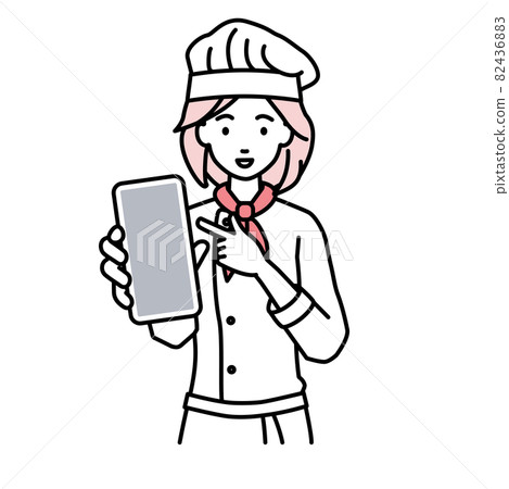 A cook woman standing and pointing at her smartphone A cook woman standing and pointing at her smartphone 82436883