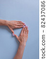 Two beautiful woman's hands with manicure isolated on white background. Place for text. 82437086