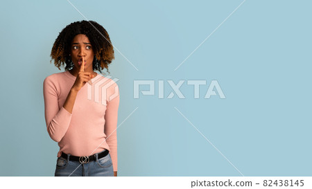 Keep Silence. Worry Black Woman Holding Finger Near Lips And Looking Away Keep Silence. Worry Black Woman Holding Finger Near Lips And Looking Away 82438145