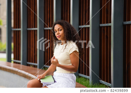 Mixed race young black woman Mixed race young black woman 82439899