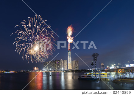 Colorful fireworks of Ho Chi Minh City at new year view from Landmark 81 riverside. Landmark 81 is the tallest building in Vietnam Colorful fireworks of Ho Chi Minh City at new year view from Landmark 81 riverside. Landmark 81 is the tallest building in Vietnam 82440899