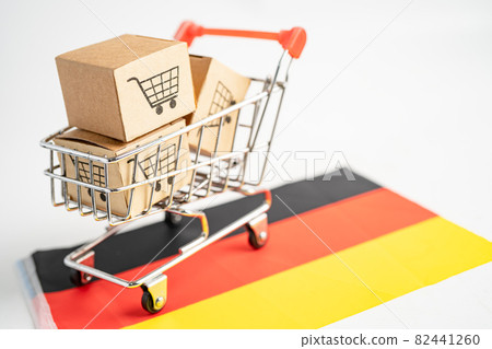 Box with shopping cart logo and Germany flag, Import Export Shopping online or eCommerce finance delivery service store product shipping, trade, supplier concept. Box with shopping cart logo and Germany flag, Import Export Shopping online or eCommerce finance delivery service store product shipping, trade, supplier concept. 82441260