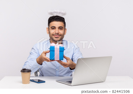Emotional man sitting and working on office Emotional man sitting and working on office 82441506