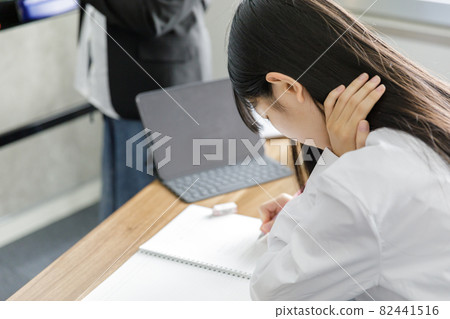 High school girl studying at a cram school High school girl studying at a cram school 82441516
