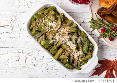 Green beans casserole with bread crumbs 82441894